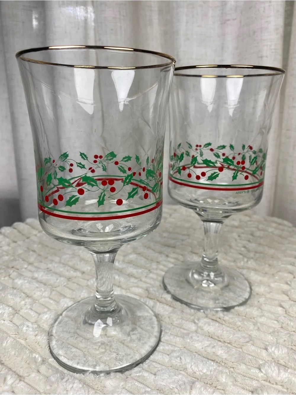 Gold-Rimmed Holiday Holly Wine Glasses in Clear with Red & Green Accents